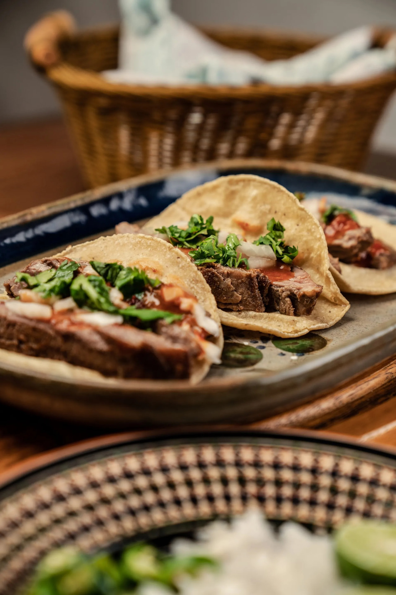 Steak tacos on a hand-painted Mexican plate